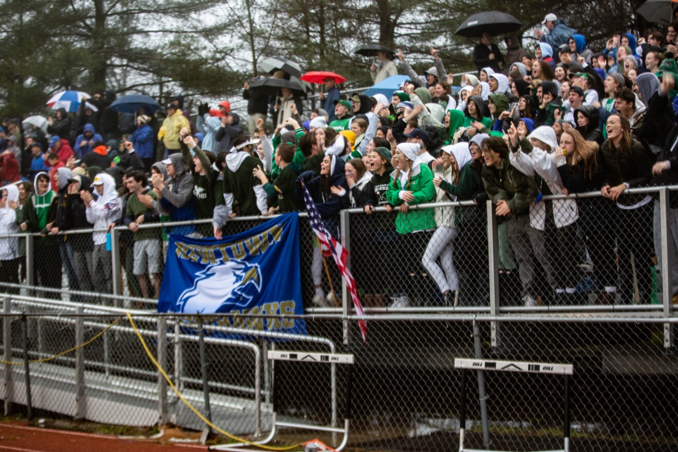 Many fans in Newtown&apos;s student section wore green, one of Sandy Hook Elementary School&apos;s colors.